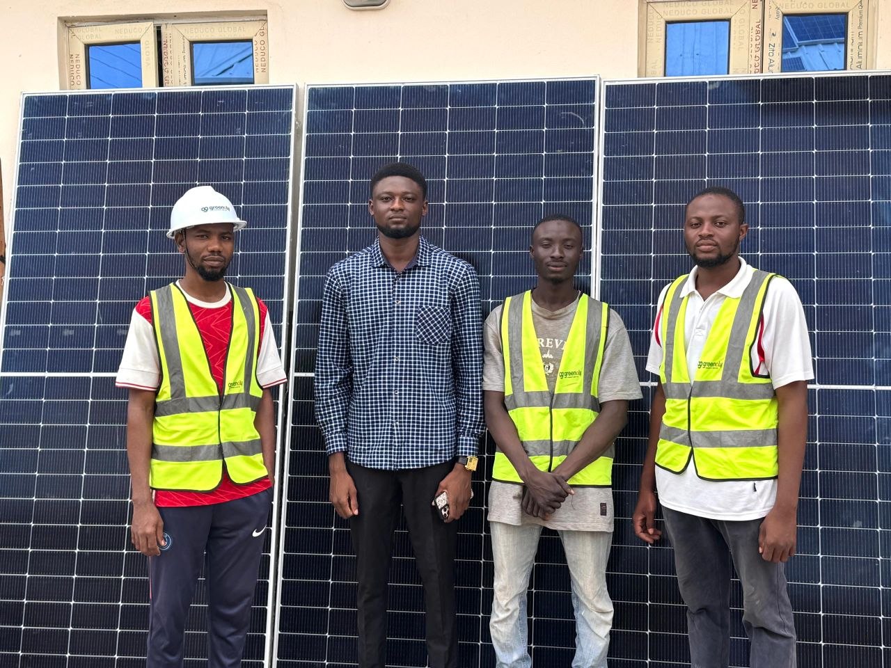 Greenoly Energy team and solar installation